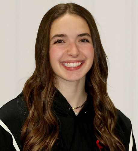 Coach Korinne